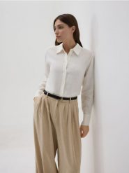 Spodnie balloon z paskiem - beżowy. Brązowe spodnie materiałowe damskie Reserved, bez wzorów, z tkaniny. Za 149.99 zł.