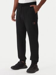 HUGO Spodnie dresowe Danopan 50553146 Czarny Relaxed Fit. Czarne spodnie dresowe męskie Hugo, bez wzorów, z bawełny. Za 549.99 zł.