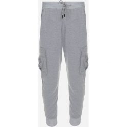 Szare Spodnie Cargo Dresowe Evaleia. Szare spodnie dresowe męskie Born2be, bez wzorów, z dresówki. Za 74.99 zł.
