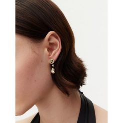 Kolczyki Guess. Żółte kolczyki damskie Guess, złote. Za 249.99 zł.