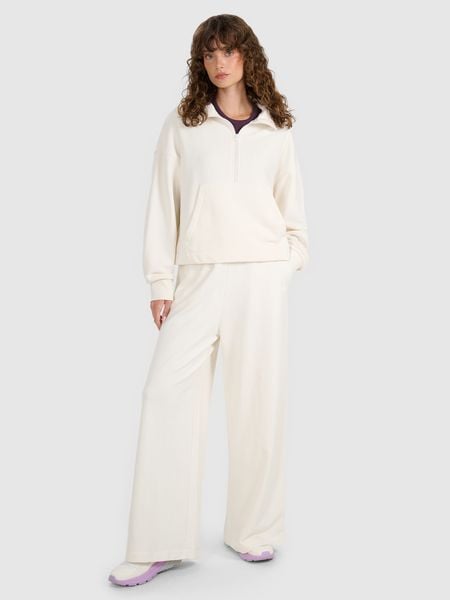 4F Spodnie dresowe z szerokimi nogawkami damskie - beżowe L. Brązowe spodnie dresowe damskie 4f, l, bez wzorów, z bawełny. W wyprzedaży za 139.99 zł.