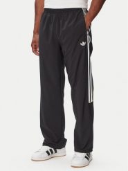 Adidas Spodnie dresowe Care Bears KR1480 Czarny Oversize. Czarne spodnie dresowe męskie Adidas, bez wzorów, z bawełny. Za 219.99 zł.