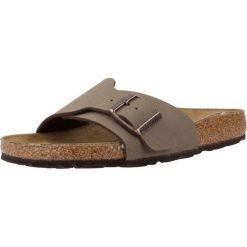 Klapki damskie Birkenstock Catalina. Czarne klapki damskie Birkenstock, bez wzorów, z materiału, bez obcasa. Za 502.00 zł.