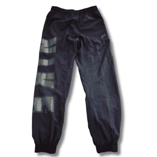Spodnie sportowe Nike Sportswear Woven Pants. Czarne spodnie dresowe damskie Nike, l, bez wzorów, z dresówki. Za 247.25 zł.