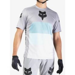 Koszulka rowerowa męska Fox Ranger SS Jersey Grid. Szare t-shirty sportowe męskie FOX, m, z jersey, bez ramiączek, rowerowe. Za 167.99 zł.