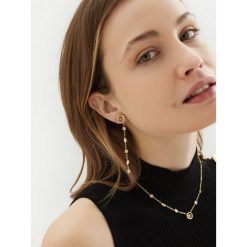 Kolczyki Guess. Żółte kolczyki damskie Guess, złote. Za 259.99 zł.