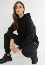 Czarna Bluza Kangurka z Polarem Fasa. Czarne bluzy bez kaptura damskie Born2be, s, bez wzorów, z dzianiny, bez ramiączek, długie, bez kaptura. Za 39.99 zł.
