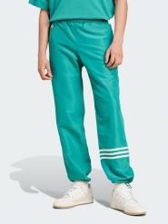 Adidas Spodnie dresowe "Neuclassics" w kolorze turkusowym rozmiar: XL. Niebieskie spodnie dresowe męskie Adidas, bez wzorów, z dresówki. Za 187.49 zł.