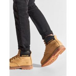 Trapery CAT Footwear. Żółte buty zimowe męskie CAT Footwear, bez zapięcia. Za 579.99 zł.