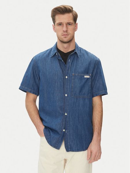 Calvin Klein Jeans Koszula jeansowa J30J327178 Niebieski Regular Fit. Niebieskie koszule męskie Calvin Klein Jeans, m, bez wzorów, z bawełny, bez kołnierzyka, bez ramiączek. Za 219.99 zł.