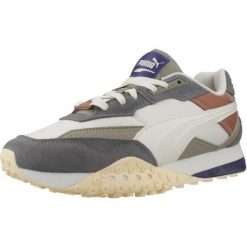 Tenisówki Puma Model Blktop Rider Dusty Kolor Szary. Szare trampki i tenisówki męskie Puma, bez wzorów, ze skóry, bez zapięcia. W wyprzedaży za 411.50 zł.