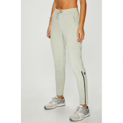 Adidas Performance - Spodnie. Zielone spodnie sportowe damskie adidas Performance, s, z dzianiny. W wyprzedaży za 249.90 zł.
