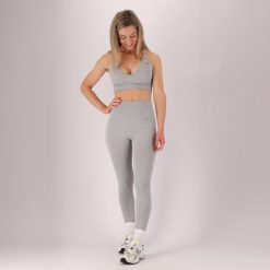 Damski zestaw sportowy - Legginsy/stanik - Szary. Szare biustonosze sportowe damskie XTREME, s, bez wzorów, z dresówki. Za 207.04 zł.