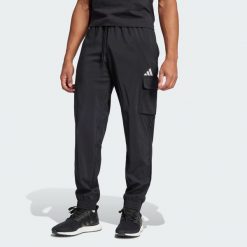 Spodnie Essentials Small Logo Cargo. Brązowe spodnie sportowe męskie Adidas, z materiału. Za 229.00 zł.