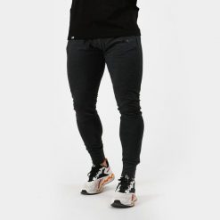 Spodnie dresowe męskie fitness slim Urban. Szare spodnie sportowe męskie GYMBEAM, z bawełny. Za 115.90 zł.