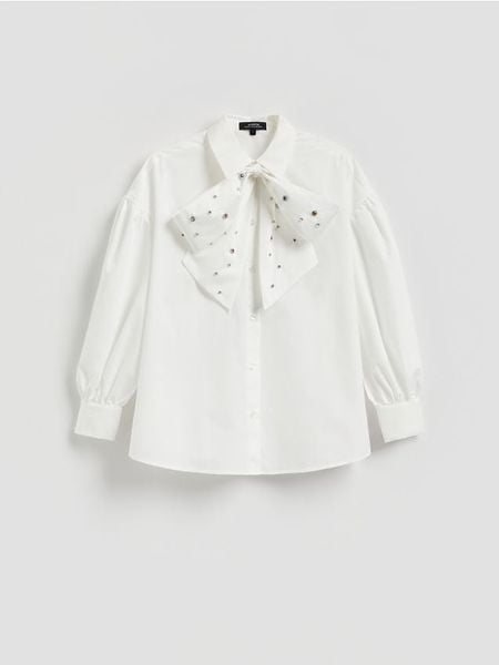 Koszula z wiązaniem - biały. Białe koszule damskie Reserved, l, bez wzorów, z bawełny, bez kołnierzyka, bez ramiączek. Za 179.99 zł.