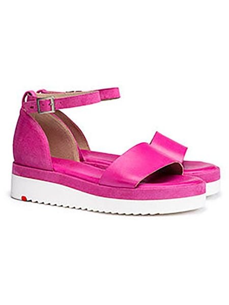 LLOYD Skórzane sandały w kolorze różowym na koturnie rozmiar: 39. Różowe sandały damskie Lloyd, bez wzorów, ze skóry, bez obcasa, na koturnie. Za 329.42 zł.