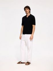 Ażurowy sweter polo - czarny. Czarne swetry męskie Reserved, l, w ażurowe wzory, z bawełny, bez kołnierzyka. Za 129.99 zł.