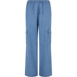 Dżinsowe spodnie cargo dla kobiet Urban Classics. Niebieskie spodnie materiałowe damskie Urban Classics, bez wzorów, z bawełny. Za 169.70 zł.