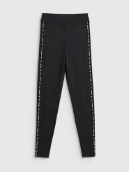 4F Legginsy dzianinowe damskie - czarne L. Czarne legginsy damskie 4f, l, bez wzorów, z dzianiny. Za 99.99 zł.