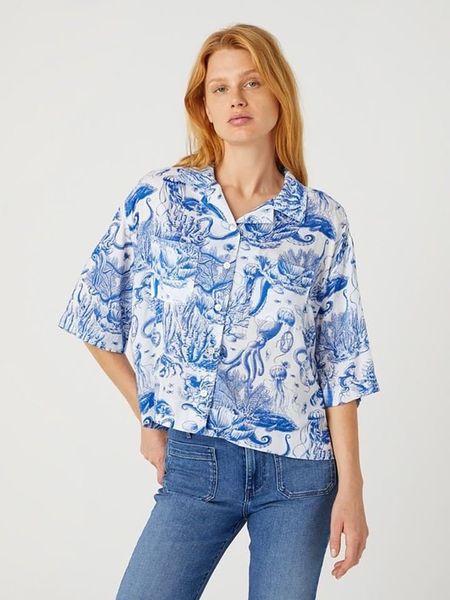 Wrangler Bluzka w kolorze niebiesko-białym rozmiar: XS. Białe bluzki damskie Wrangler, xs, bez wzorów, z wiskozy, bez kołnierzyka, bez ramiączek. Za 121.99 zł.
