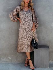 Milan Kiss Sukienka w kolorze beżowo-czarnym rozmiar: M. Brązowe sukienki damskie Milan Kiss, m, bez wzorów, bez kołnierzyka, bez ramiączek, midi. Za 176.50 zł.