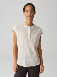 OPUS Bluzka w kolorze kremowym rozmiar: L. Brązowe bluzki damskie Opus, l, bez wzorów, bez kołnierzyka, bez ramiączek. Za 100.99 zł.