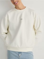 Bluza z naszywką - kremowy. Białe bluzy bez kaptura męskie Reserved, l, z bawełny. W wyprzedaży za 59.99 zł.