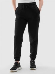 4F Spodnie dresowe joggery damskie - czarne M. Czarne spodnie dresowe damskie 4f, m, bez wzorów, z bawełny. Za 129.99 zł.