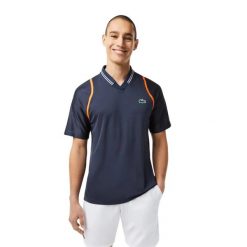 Koszulka sportowa polo męska Lacoste Polo. Niebieskie koszulki polo męskie Lacoste, l, z aplikacjami, z materiału, bez ramiączek. Za 327.00 zł.