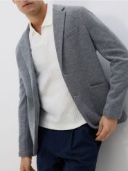 Dzianinowa marynarka slim fit - granatowy. Niebieskie marynarki męskie Reserved, bez wzorów, z bawełny. W wyprzedaży za 119.99 zł.