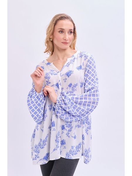 Marks & Spencer Bluzka w kolorze biało-niebieskim rozmiar: 42. Białe bluzki damskie Marks & Spencer, bez wzorów, z wiskozy, bez kołnierzyka, bez ramiączek. Za 66.45 zł.