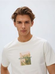 T-shirt regular z merceryzowanej bawełny - złamana biel. T-shirty męskie Reserved, l, bez wzorów, z bawełny, bez kołnierzyka. Za 79.99 zł.