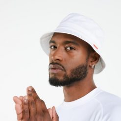 Kapelusz żeglarski Decathlon Sailing 100. Białe kapelusze damskie TRIBORD, bez wzorów, z bawełny. Za 49.99 zł.