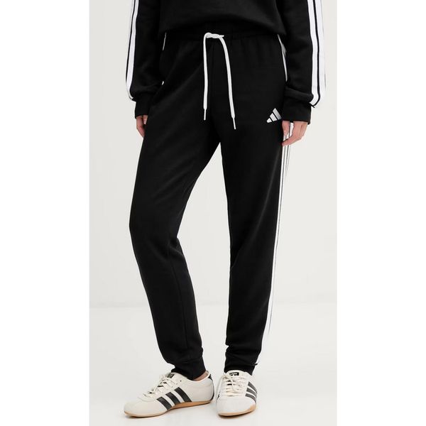 Spodnie damskie adidas Essentials 3-Stripes Fleece Slim. Czarne spodnie dresowe damskie Adidas, na fitness i siłownię. Za 171.99 zł.