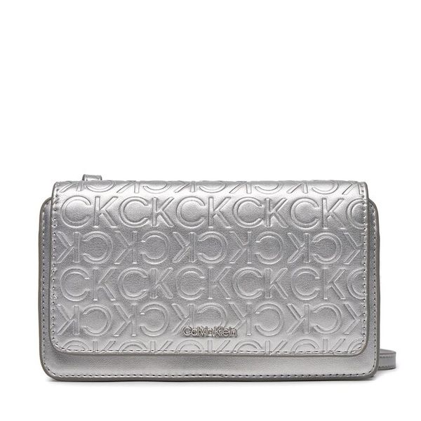 Torebka Calvin Klein. Niebieskie listonoszki damskie CALVIN KLEIN, bez wzorów, z denimu, bez dodatków. Za 329.99 zł.