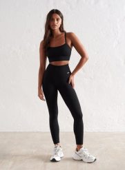 Damskie legginsy prążkowane, bezszwowe, wysoki stan, squat proof, petite czarne. Czarne legginsy damskie Aim'n, xs, bez wzorów, z dzianiny. Za 254.00 zł.