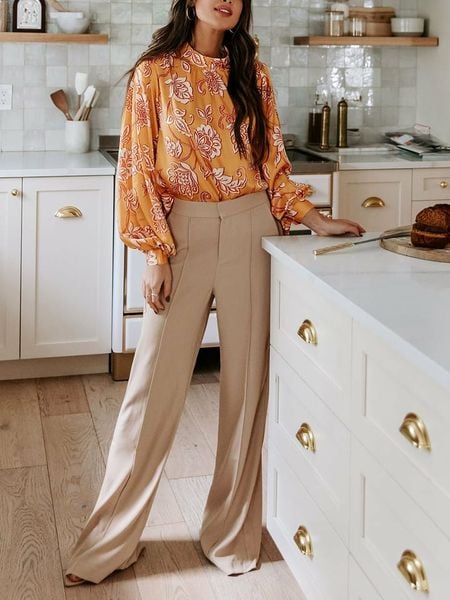 Milan Kiss Bluzka w kolorze żółto-białym rozmiar: L. Białe bluzki damskie Milan Kiss, l, bez wzorów, bez kołnierzyka, bez ramiączek. Za 126.99 zł.