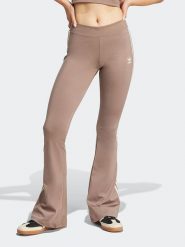 Adidas Legginsy w kolorze beżowym rozmiar: XL. Brązowe legginsy damskie Adidas, xl, bez wzorów. Za 188.85 zł.