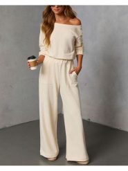 Milan Kiss 2-częściowy zestaw w kolorze beżowym rozmiar: M. Brązowe spodnie dresowe damskie Milan Kiss, m, bez wzorów, z dresówki. Za 173.99 zł.