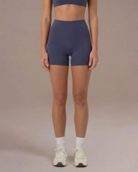 Szorty Motion - Szaroniebieski. Niebieskie spodenki sportowe damskie JOY STUDIO, m, z materiału, do biegania. Za 168.00 zł.