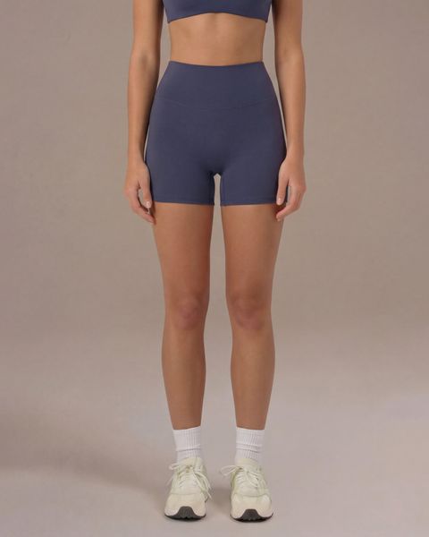 Szorty Motion - Szaroniebieski. Niebieskie spodenki sportowe damskie JOY STUDIO, m, z materiału, do biegania. Za 168.00 zł.