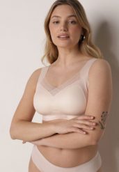 Beżowy Biustonosz Sportowy z Siateczką i Usztywnionymi Miseczkami Zerirae. Brązowe biustonosze sportowe damskie Born2be, bez wzorów, z dresówki. Za 29.99 zł.