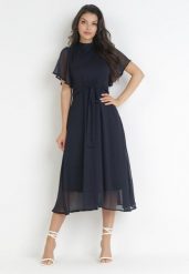 Granatowa Sukienka o Rozkloszowanym Kroju z Wiązaniem Acsophia. Niebieskie sukienki damskie Born2be, na imprezę, m, bez wzorów, z materiału, eleganckie, bez kołnierzyka, bez ramiączek, midi, rozkloszowane. W wyprzedaży za 119.99 zł.