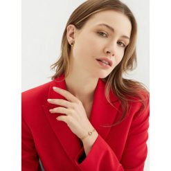 Bransoletka Guess. Żółte bransoletki damskie Guess, złote. Za 179.99 zł.
