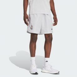 Szorty Real Madrid UBP. Białe szorty męskie Adidas, z materiału, bez kołnierzyka. Za 149.00 zł.