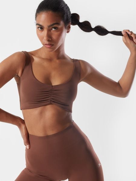 4F Top szybkoschący z materiałów z recyklingu damski 4F x Anna Lewandowska XS. Brązowe topy damskie 4f, xs, bez wzorów, z dzianiny, bez kołnierzyka. W wyprzedaży za 59.99 zł.