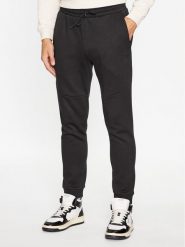 Puma Spodnie dresowe Pumatech 538286 Czarny Regular Fit. Czarne spodnie dresowe męskie Puma, bez wzorów, z bawełny. Za 349.99 zł.