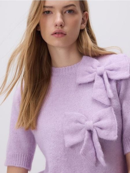 Sweter z kokardami - fioletowy. Fioletowe swetry klasyczne damskie Reserved, l, z dzianiny, bez kołnierzyka. Za 129.99 zł.