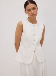 Taliowana kamizelka z lnem - biały. Białe kamizelki damskie Reserved, l, z tkaniny. W wyprzedaży za 109.99 zł.
